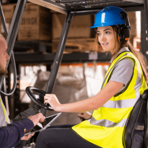 Woman learning to drive a forklift at Australian Forklift Training Blacktown